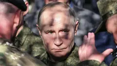 путін