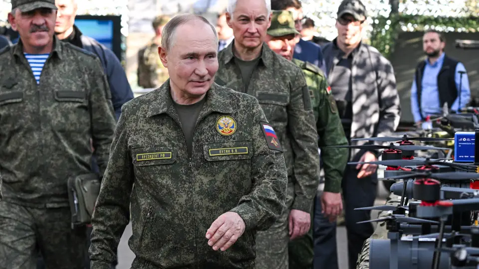 путін
