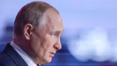 путін
