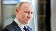 путін