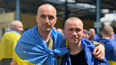 Повернені воїни з полону. 